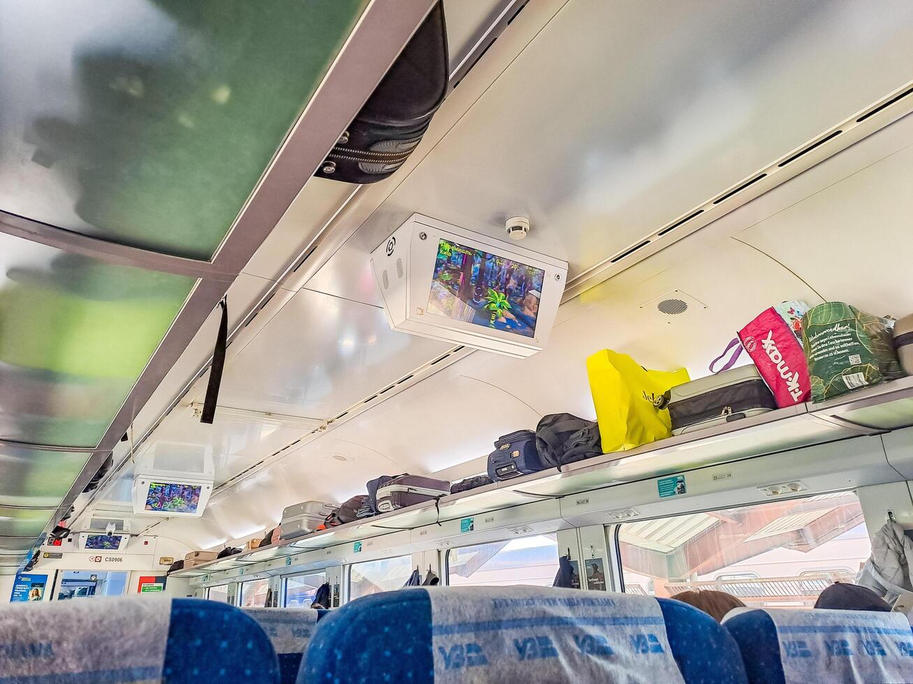 Lviv- Ukraine- 20 September 2024. Modern tv screen inside bus, train, or tram. photo