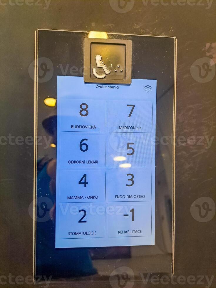 touch dashboard of a modern elevator, for calling the elevator in the polyclinic photo