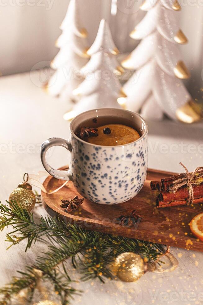 Steaming mug of Christmas tea photo