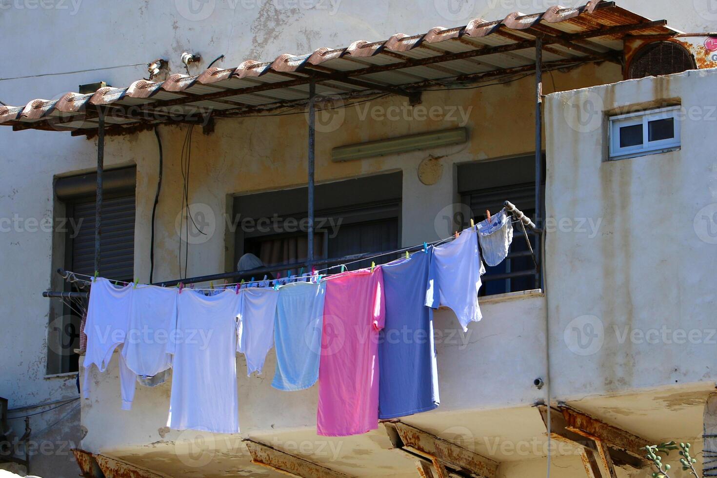 washed clothes hanging on a line photo