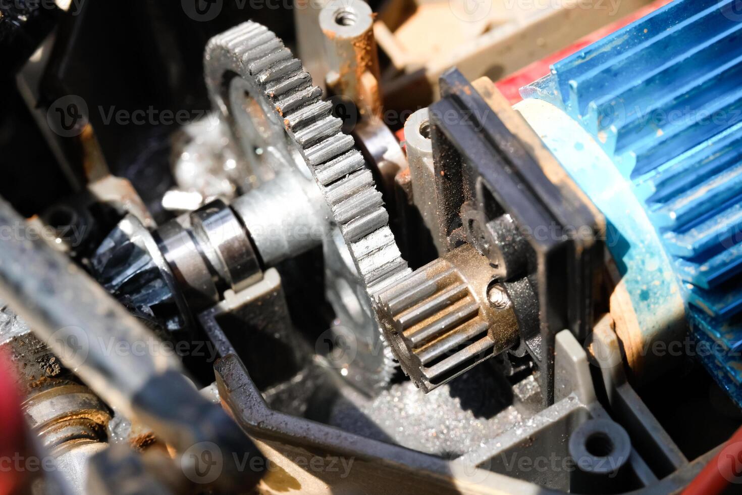 Broken RC Car Spur and Pinion gear. Spare part of Remote control car that is damaged due to overheat. Motors Gear. Hobbies and Leisures. Disassembly and repair. Gear Ratio. Modification of Toys photo