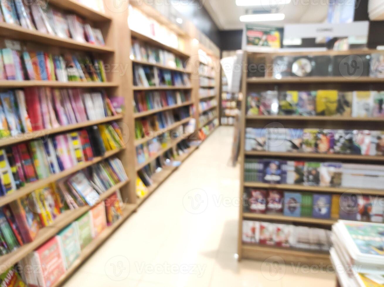 Blurred Backgrounds Shelves and stacks of books in a bookstore. The books sold are neatly arranged and categorized in rows of special bookshelves. Wallpaper Backgrounds. Bookstore Themes photo