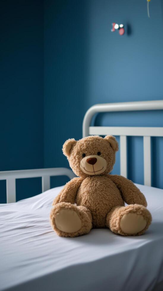Soft bear sitting on a bed in a cozy blue room with calming atmosphere photo