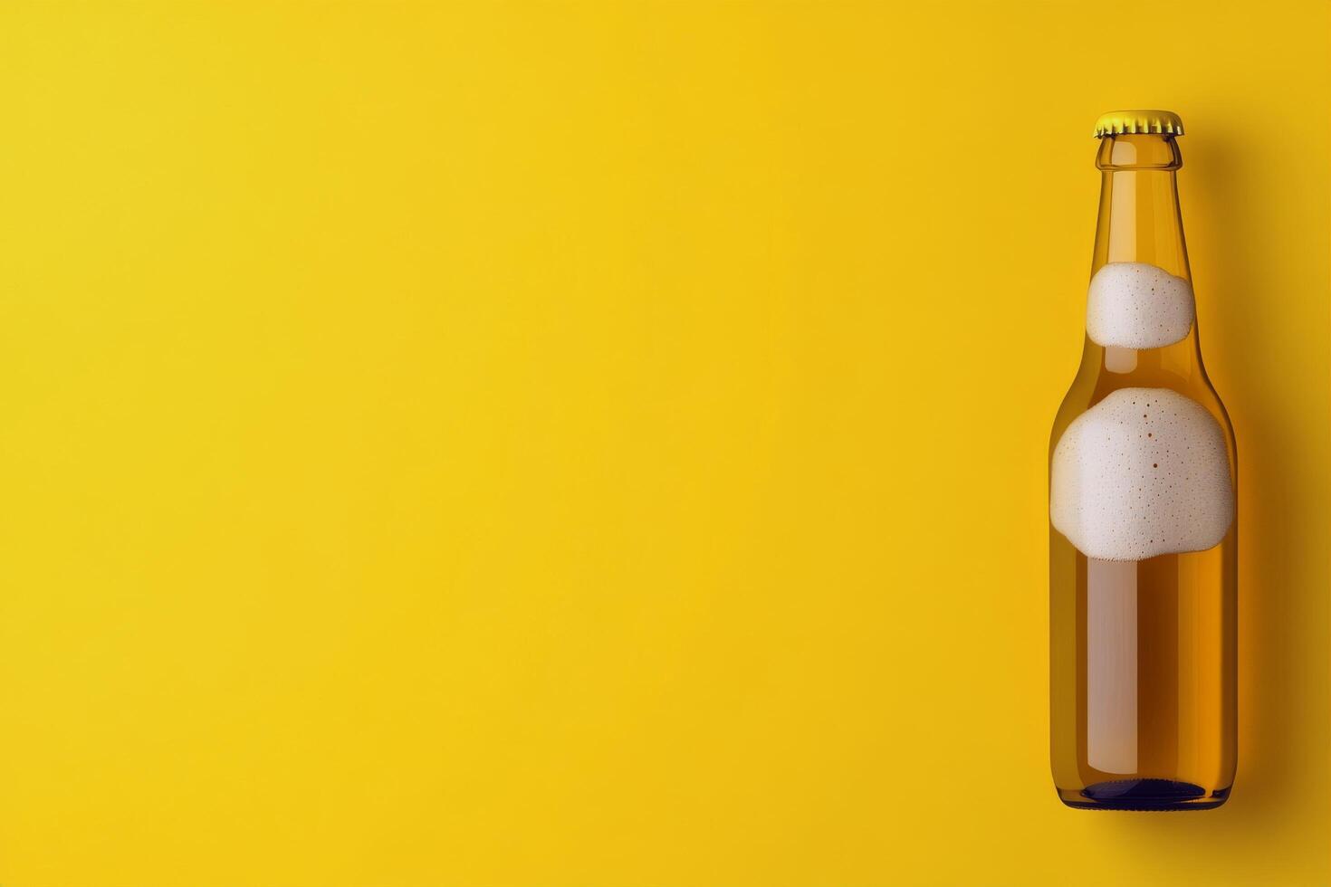 Golden beer bottle with foam on top against a bright yellow background photo