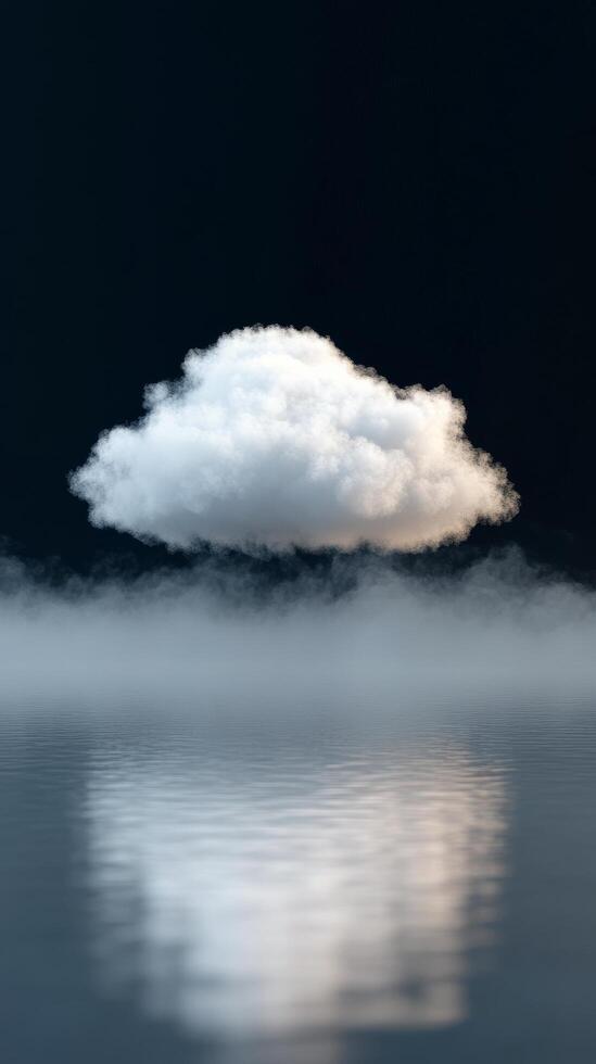 Cloud hovering above calm water with mist in serene atmosphere photo