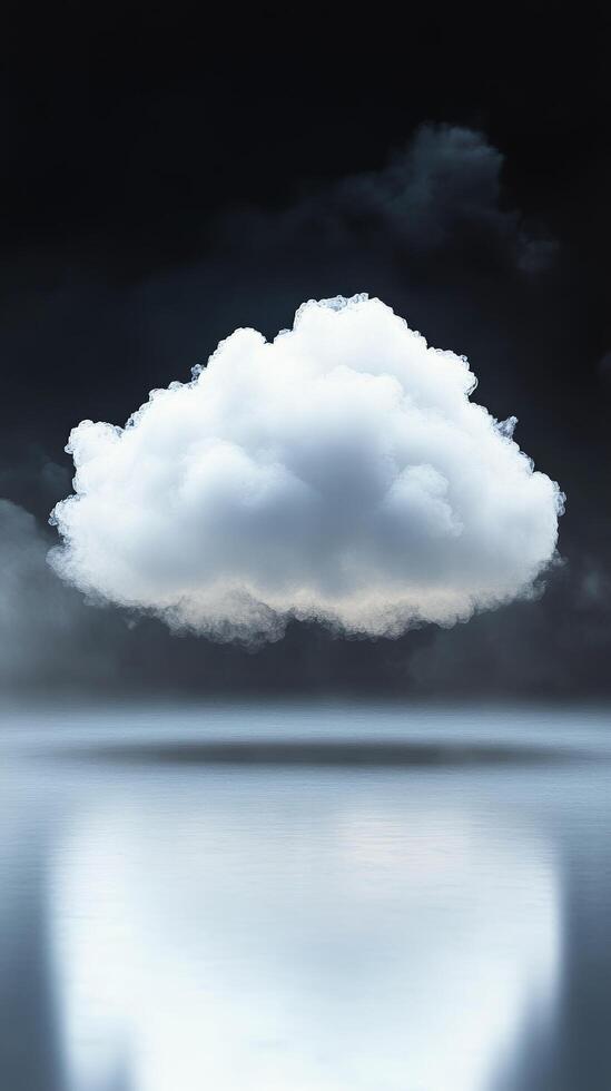 Cloud hovering above calm water with mist in serene atmosphere photo