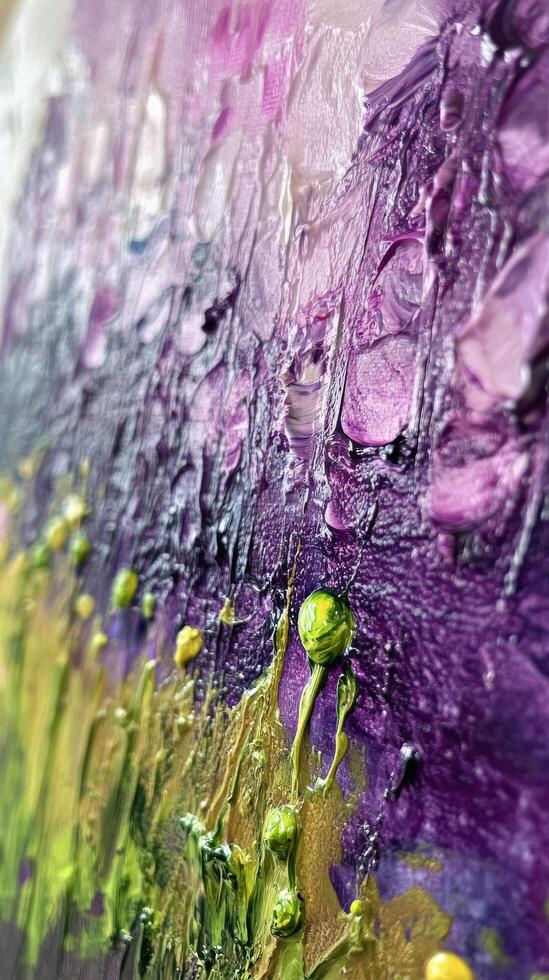 Abstract colorful swirl of purple, green, and yellow paint blending together in creative pattern photo