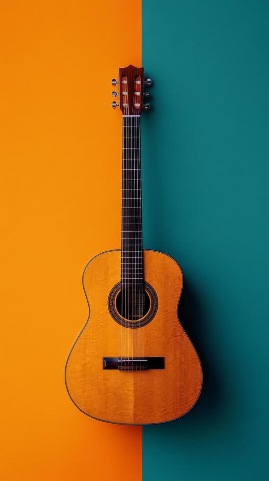 Acoustic guitar set against a bright orange and blue background for a bold contrast photo