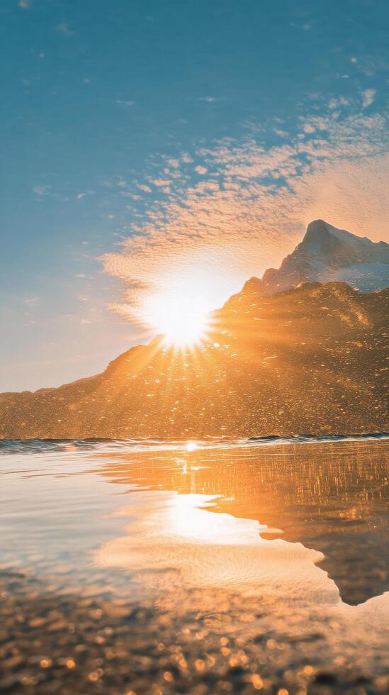 Majestic mountain peak reflects in calm lake at sunrise with vibrant colors photo