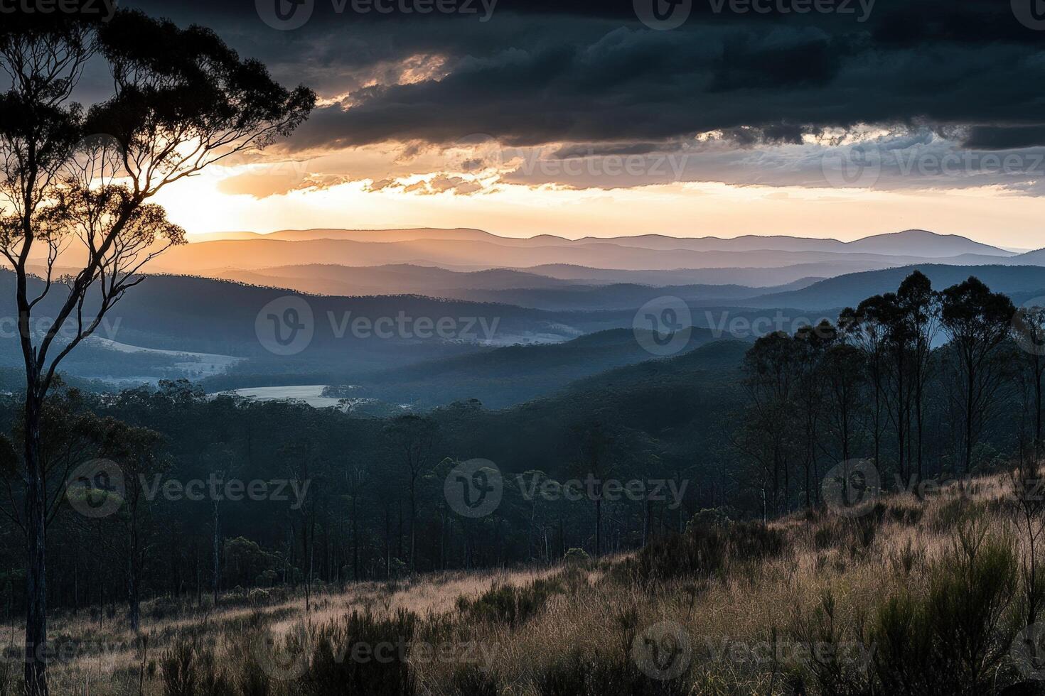A view of a sunset over a mountain range photo