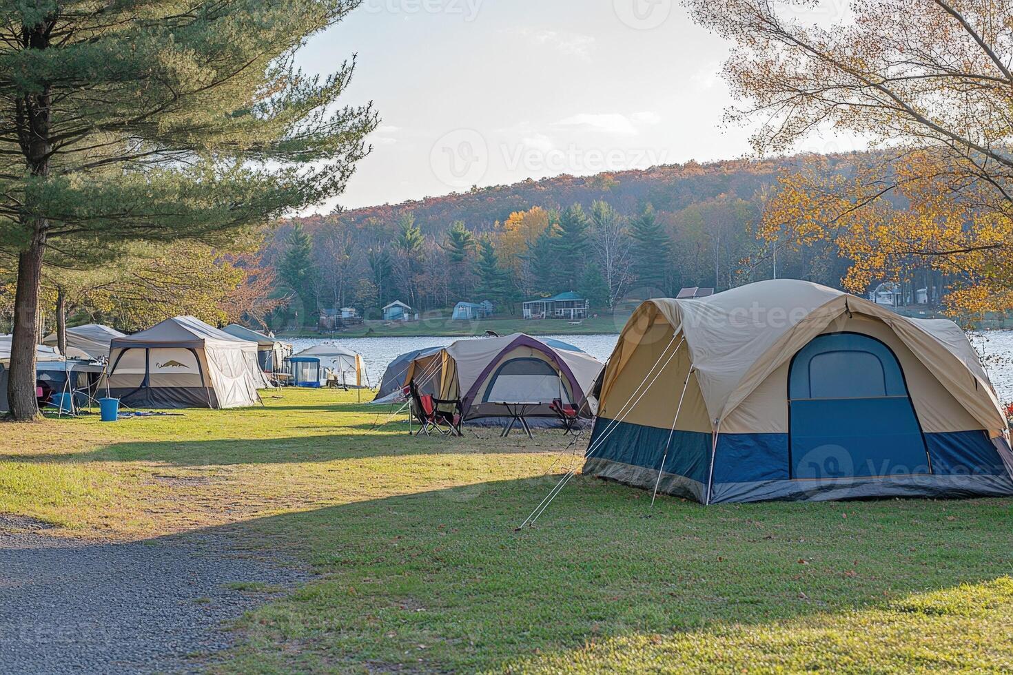 A group of tents on a grassy field photo