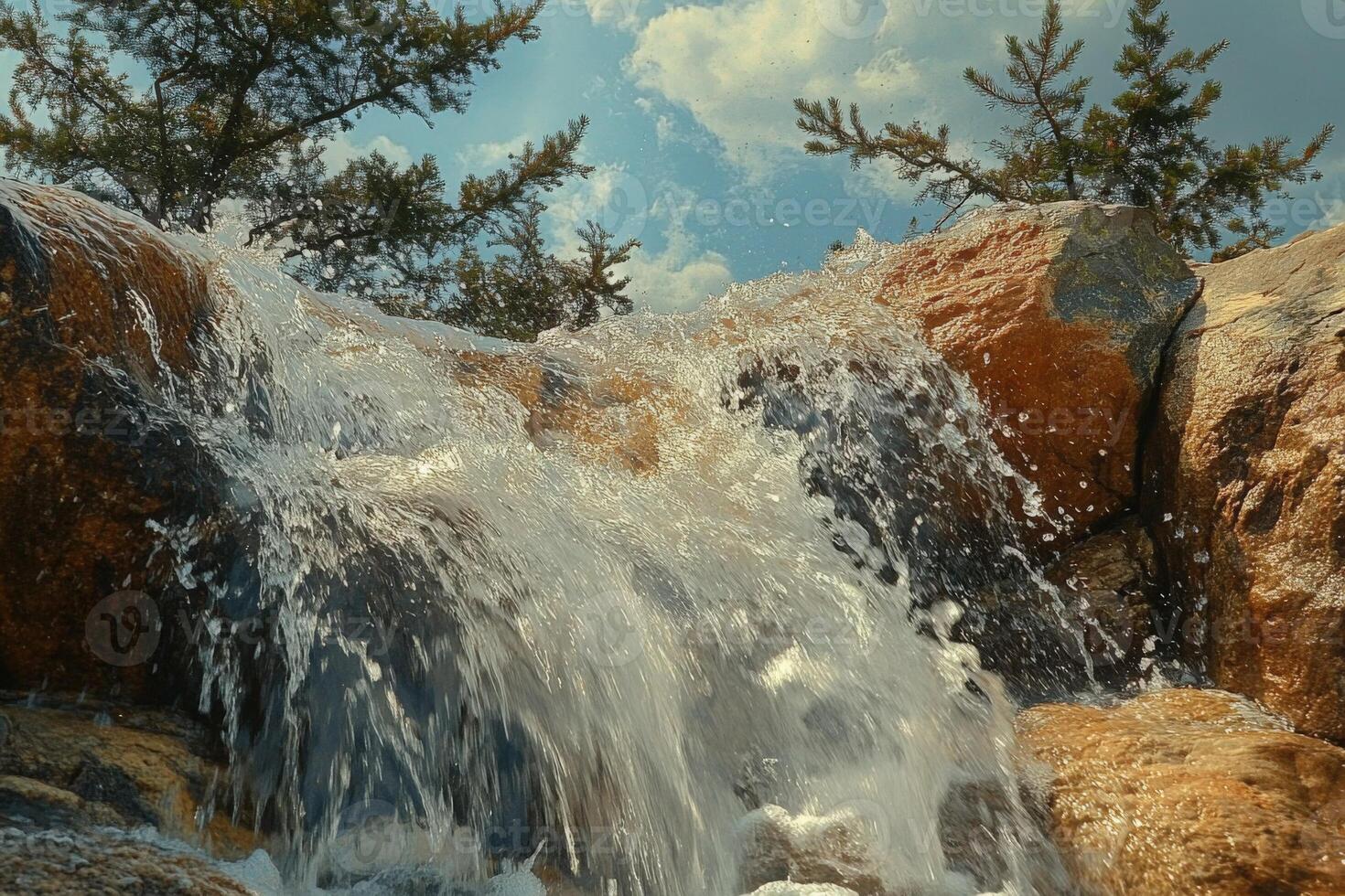 Waterfall in the mountains photo