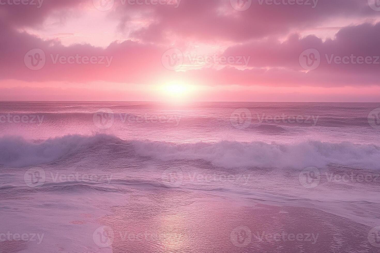 A beautiful sunset over the ocean with waves photo