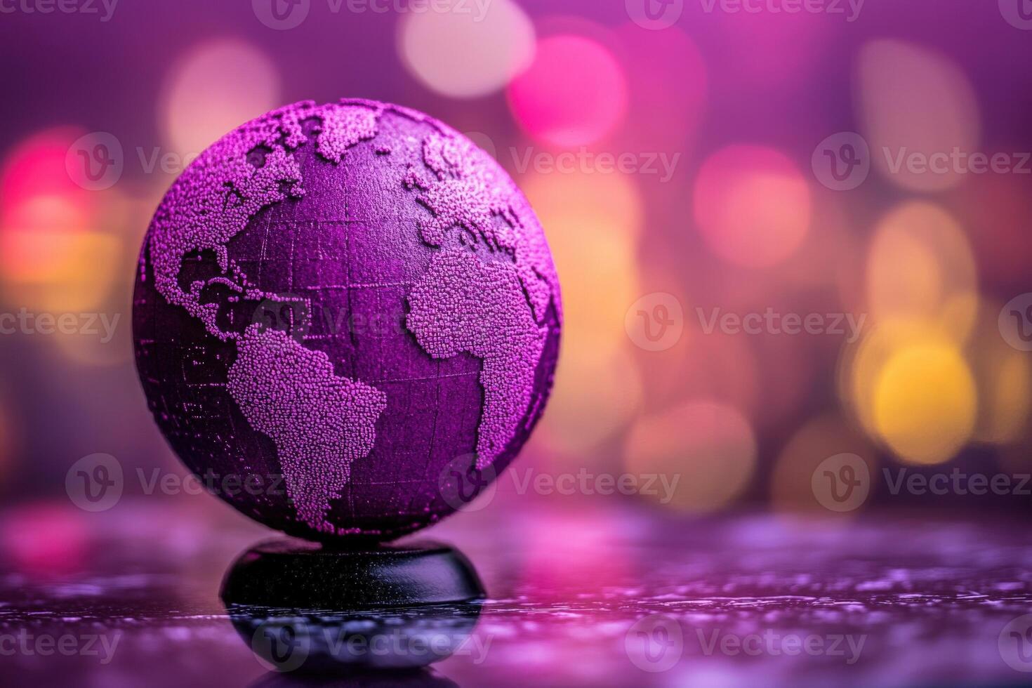 A purple globe on a table with a blurred background photo