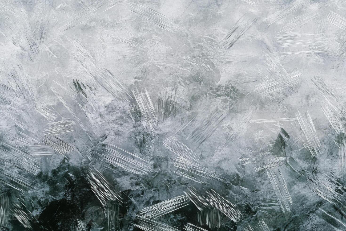 Frozen ice crystals on a window photo