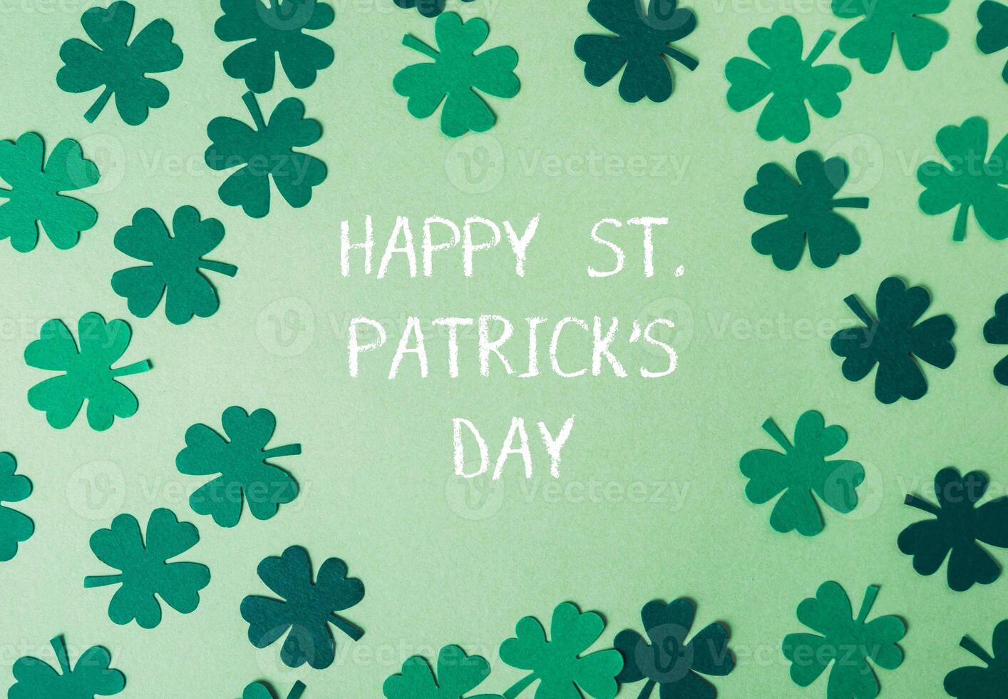 Green background with a bunch of shamrocks photo