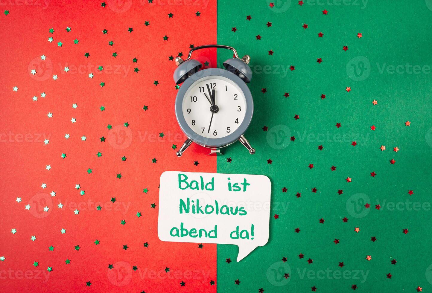 Clock is on a green background with a red background photo