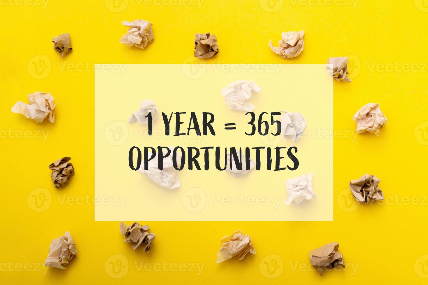 Yellow background with a bunch of crumpled paper on it photo
