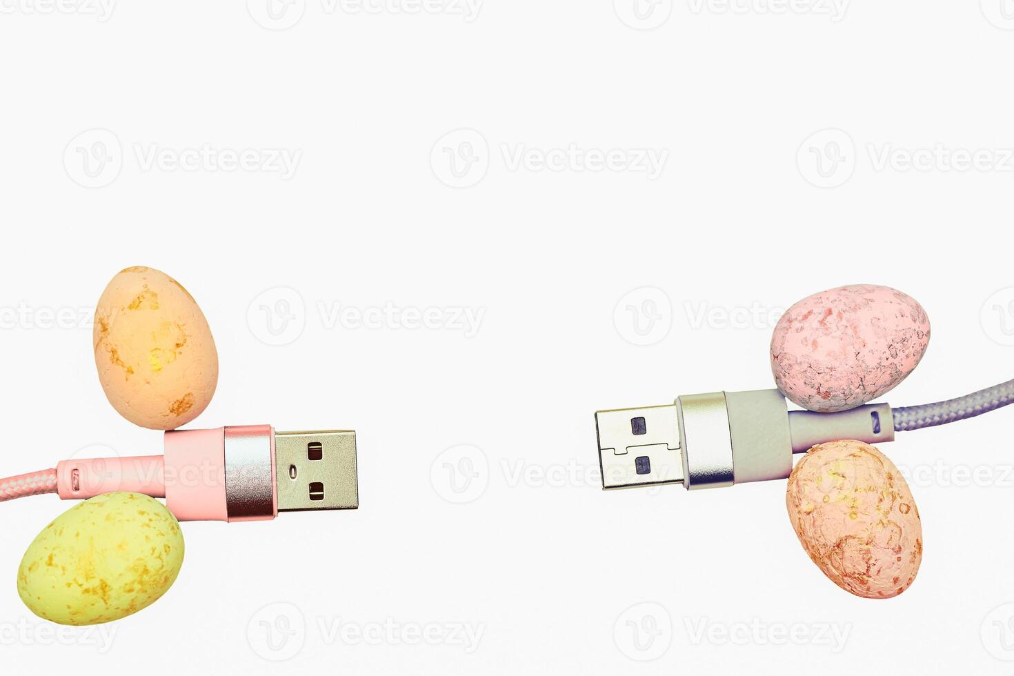 Two pink gray usb cables for connection on white photo