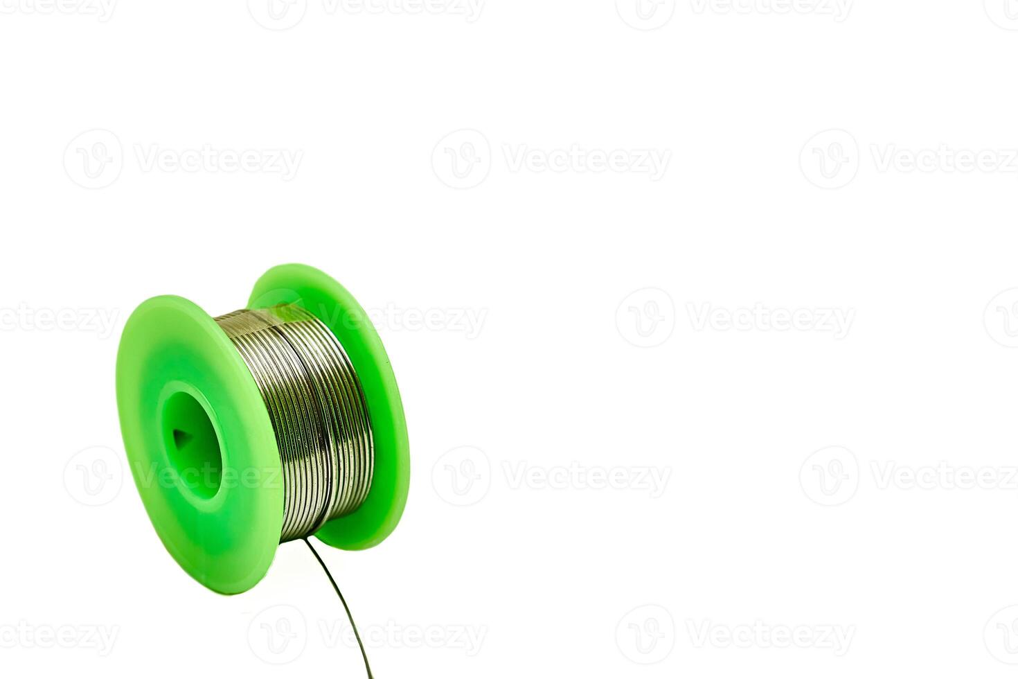 Green Spool with wound solder for soldering, wire photo