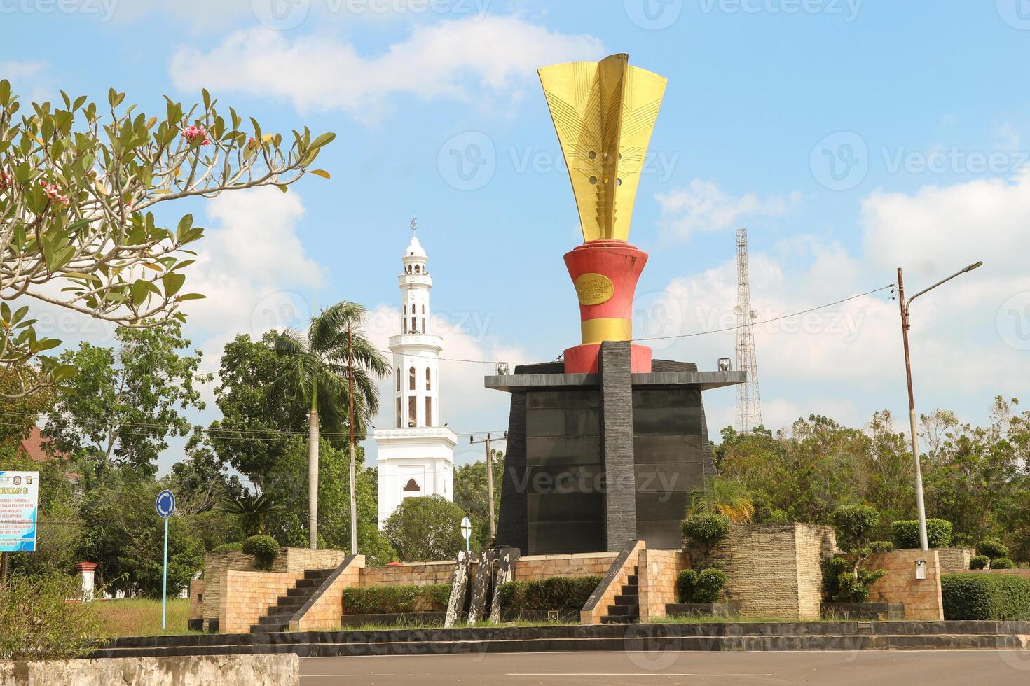 Photo of the welcome monument in Banyuasin Regency with a bright blue sky as a background