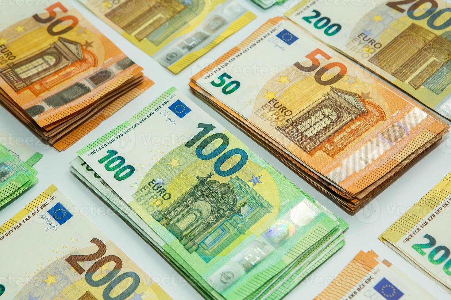 Euro banknote cash money. Lot of banknotes of European union currency close up. Financial investment, savings, income earnings concept. photo