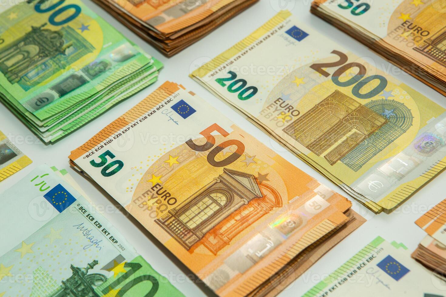 Euro banknote cash money. Lot of banknotes of European union currency close up. Financial investment, savings, income earnings concept. photo
