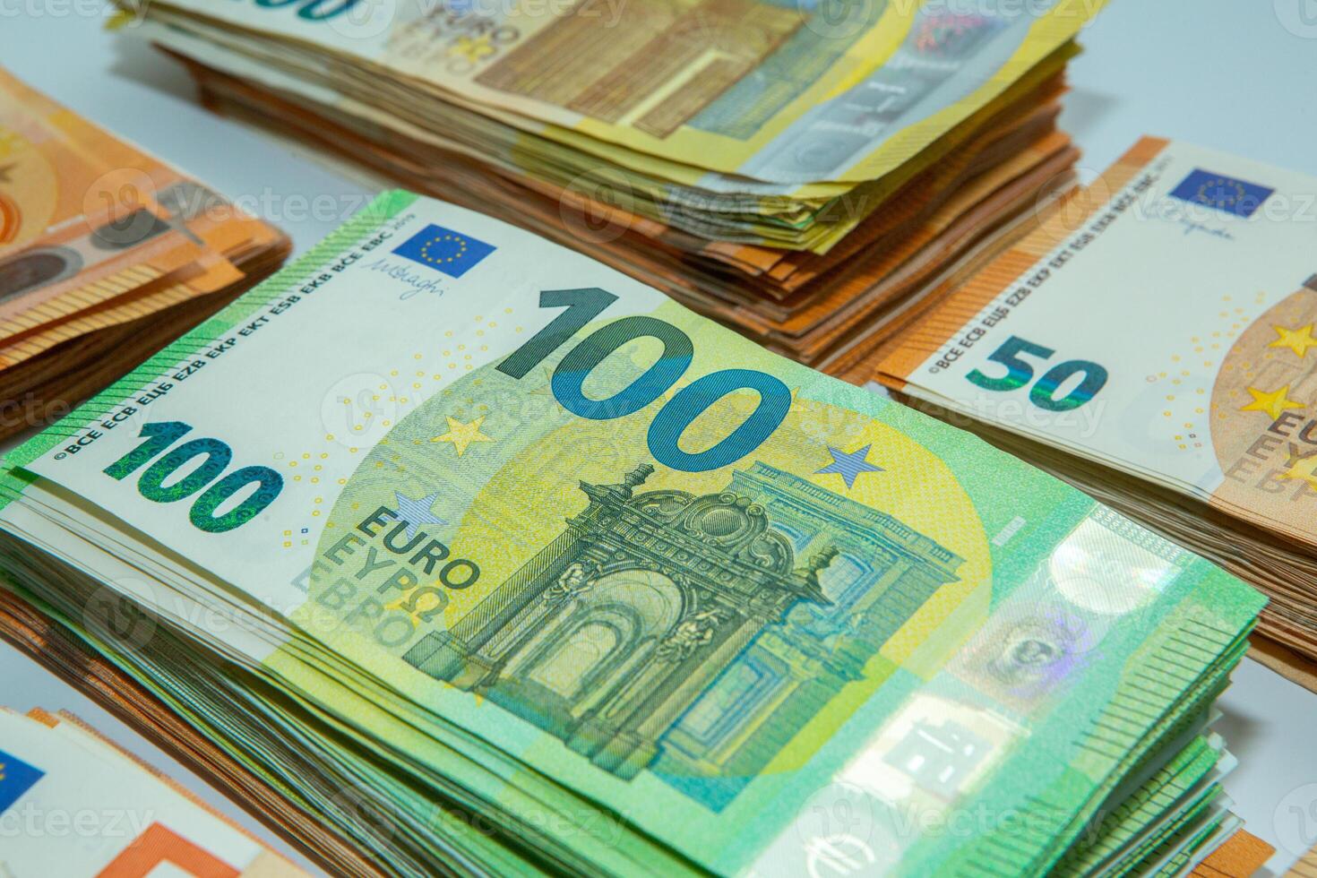 Euro banknote cash money. Lot of banknotes of European union currency close up. Financial investment, savings, income earnings concept. photo