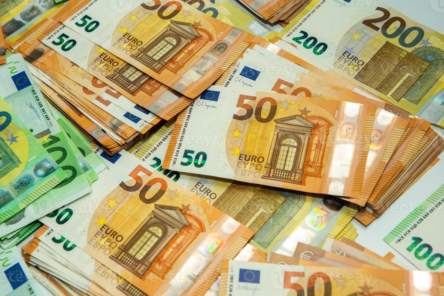 Euro banknote cash money. Lot of banknotes of European union currency close up. Financial investment, savings, income earnings concept. photo
