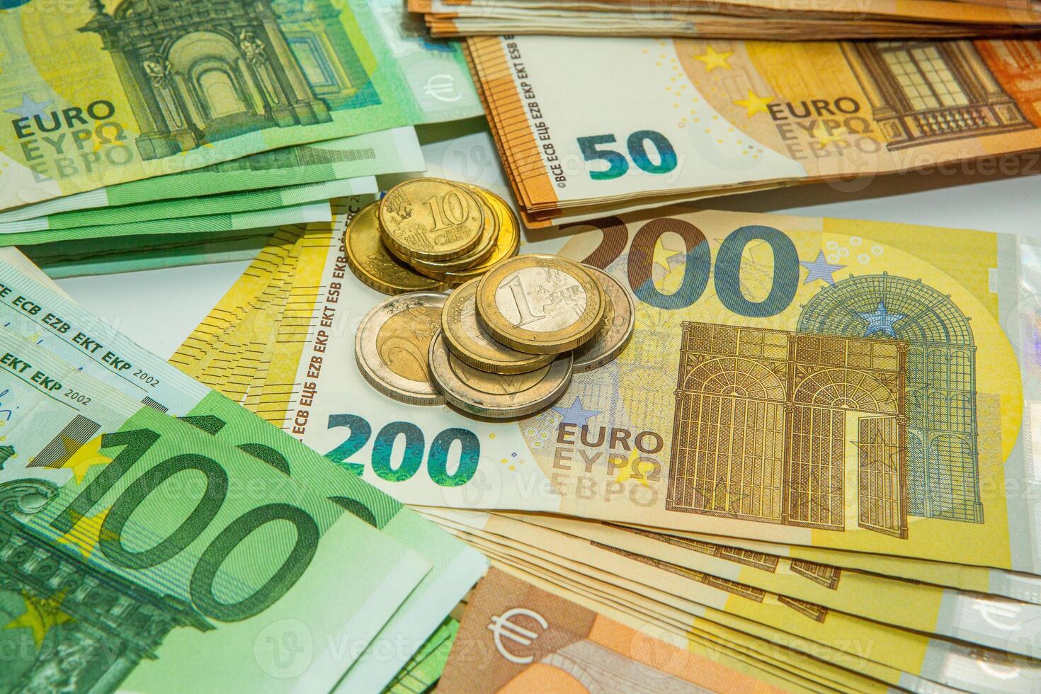 Euro banknote cash money. Lot of banknotes of European union currency close up. Financial investment, savings, income earnings concept. photo