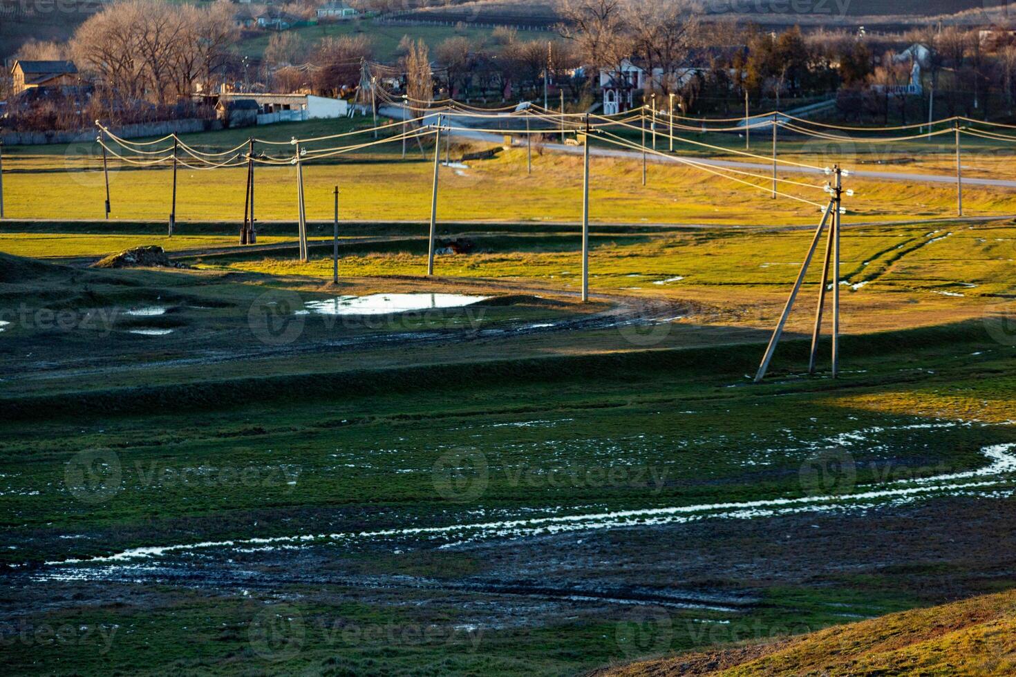 Beautiful landscape with quiet rural life of winter without snow in Moldova photo
