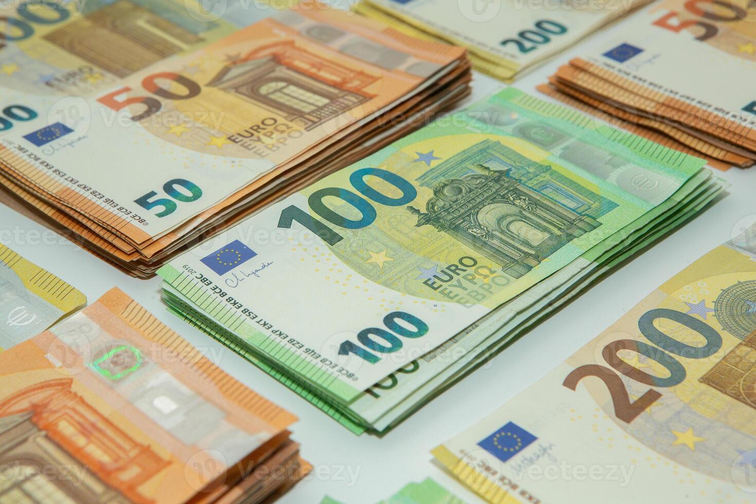 Euro banknote cash money. Lot of banknotes of European union currency close up. Financial investment, savings, income earnings concept. photo