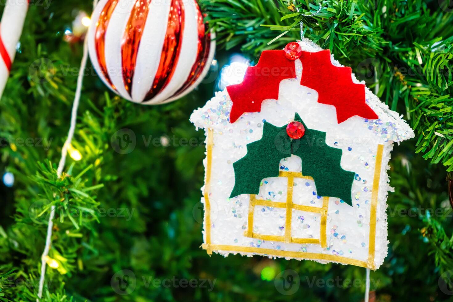 Luxurious Golden Christmas Tree Adorned with Sparkling Ornaments for the Holidays photo