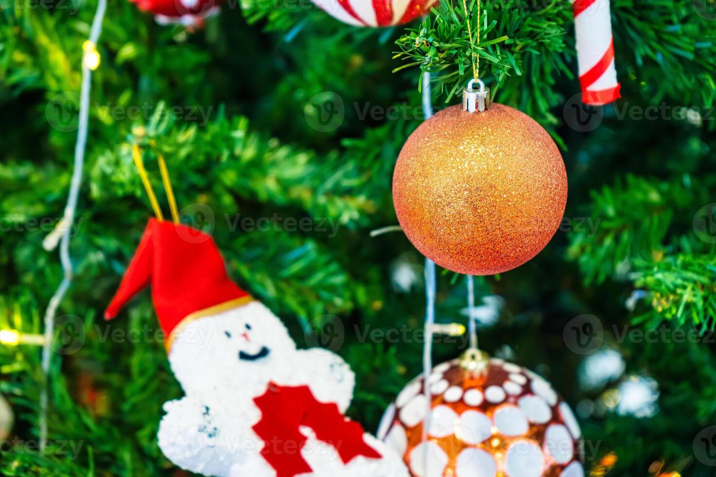 Luxurious Golden Christmas Tree Adorned with Sparkling Ornaments for the Holidays photo