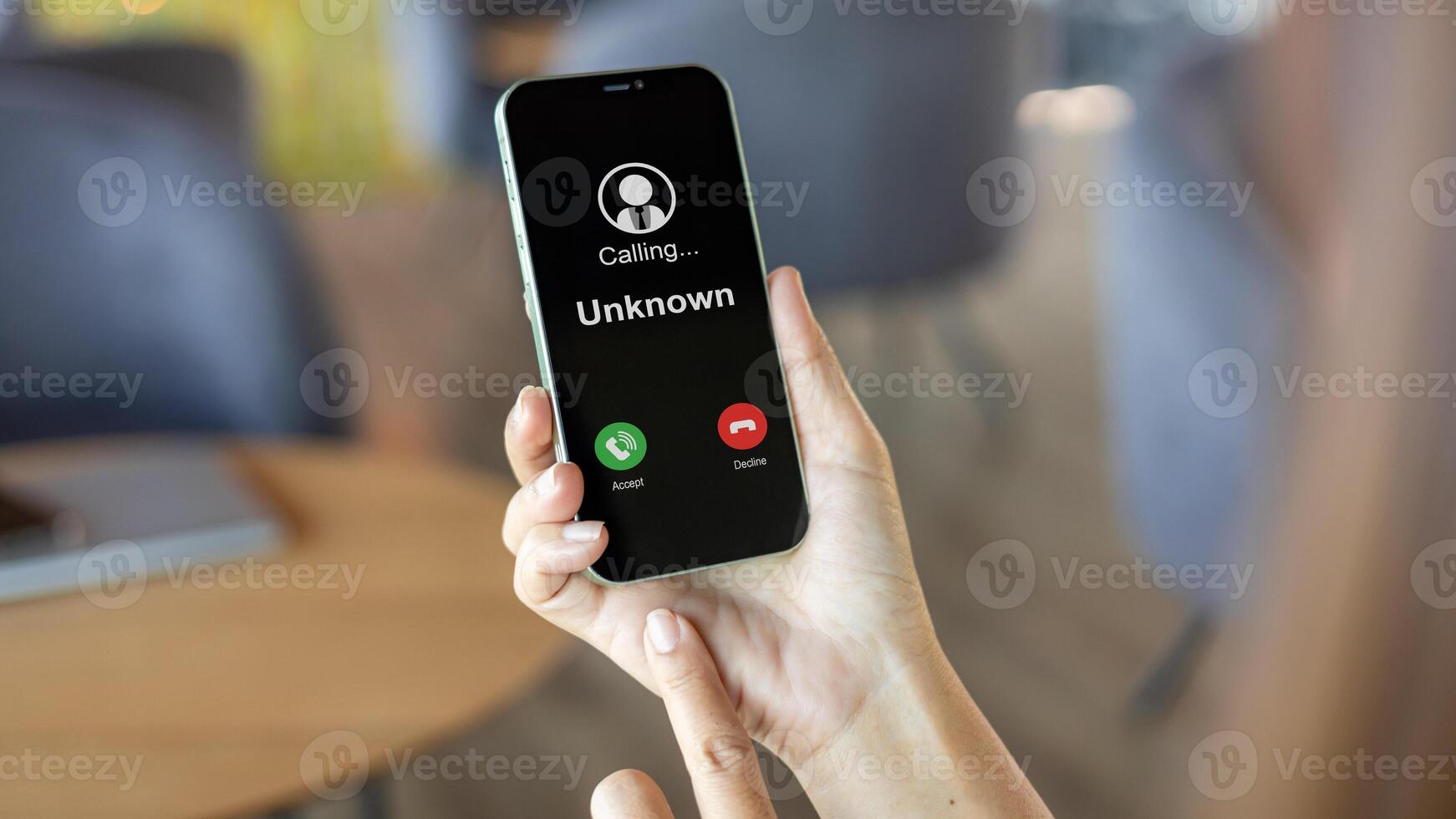 Scam with mobile phone, Woman receives a phone call from an unknown number, Concept of scammers or strangers, Fraud and contact to sell mobile internet promotions, Spam, Fake identity, Scammer. photo