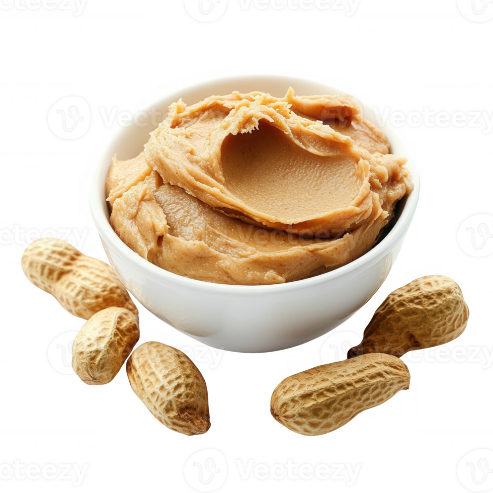 Delicious creamy peanut butter served in a bowl with whole peanuts around. png