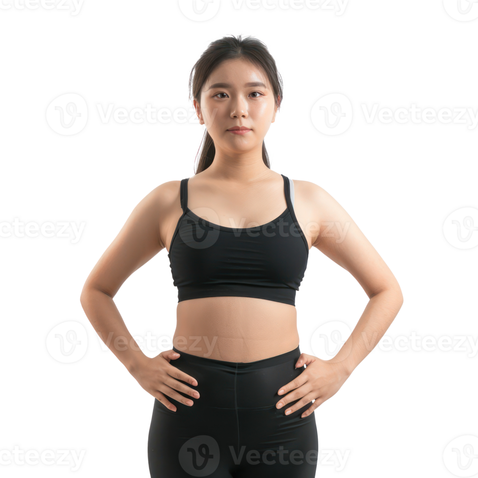 a woman in black sports bra top standing with her hands on her hips png