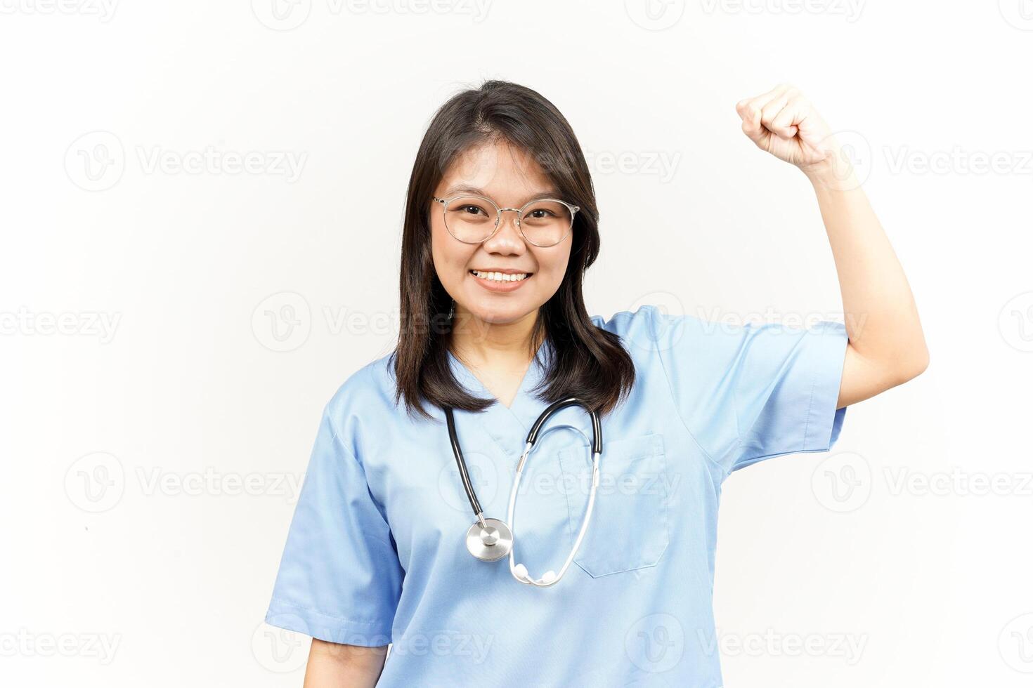 Showing Strength Arms Of Asian Young Doctor Isolated On White Background photo