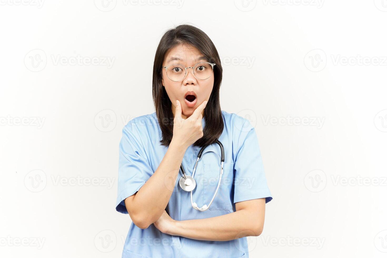 WOW and Shocked Face Expression Of Asian Young Doctor Isolated On White Background photo