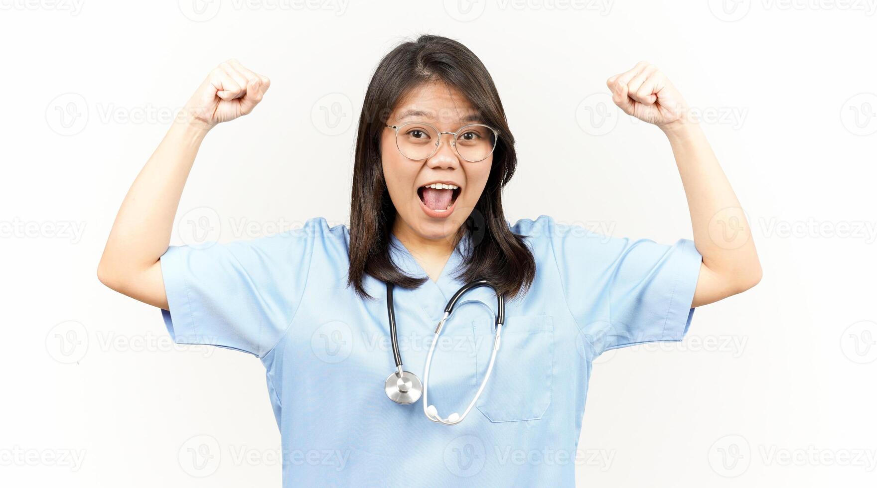 Showing Strength Arms Of Asian Young Doctor Isolated On White Background photo