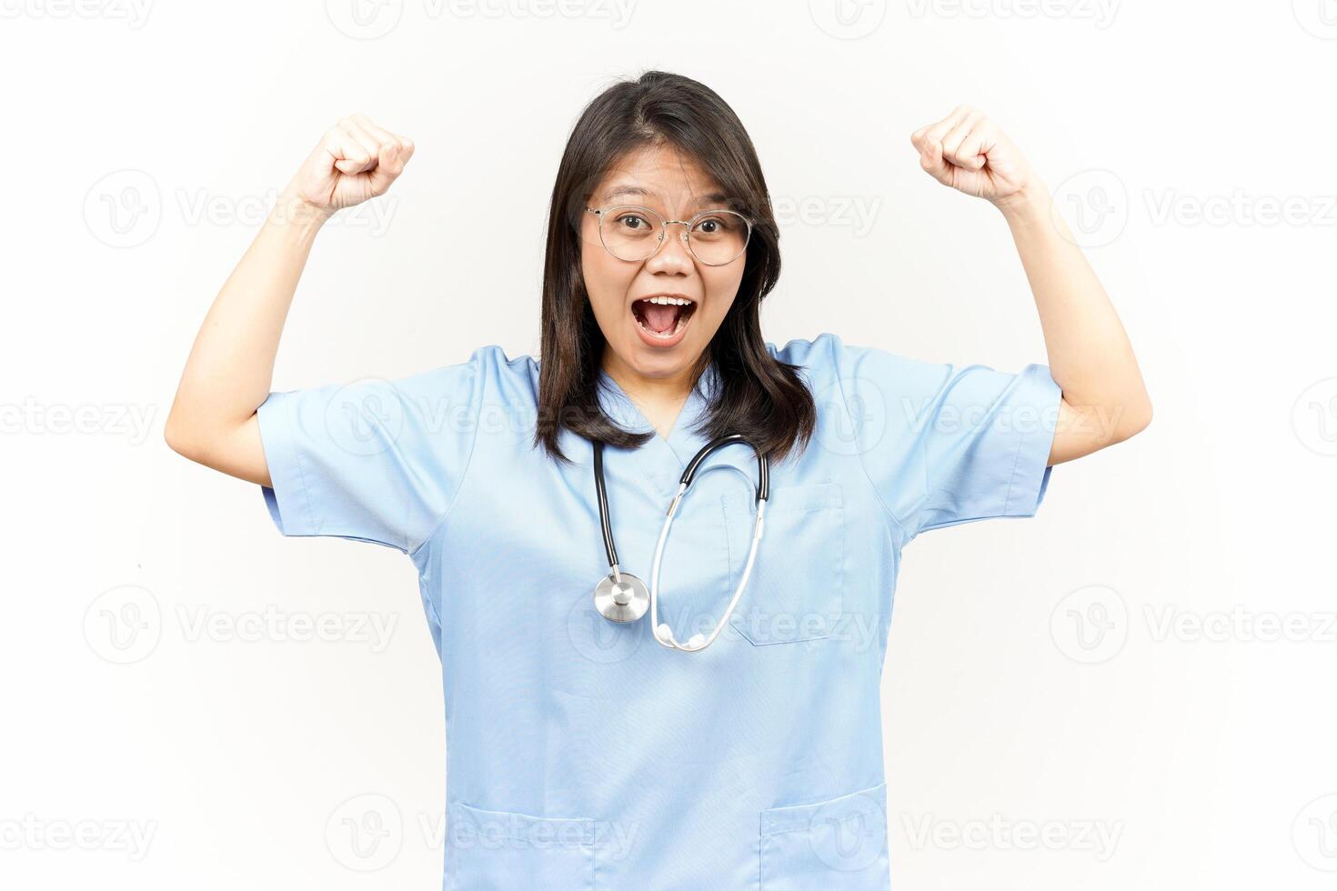 Showing Strength Arms Of Asian Young Doctor Isolated On White Background photo