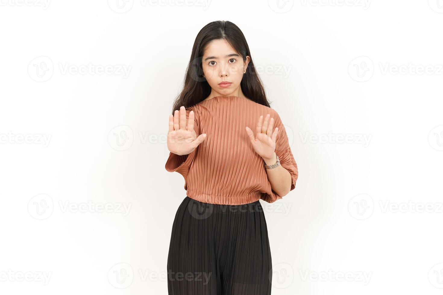 Stop or Rejection Gesture Of Beautiful Asian Woman Isolated On White Background photo