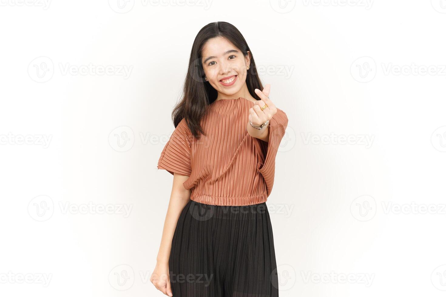 Showing Korean Love Finger Sign Of Beautiful Asian Woman Isolated On White Background photo
