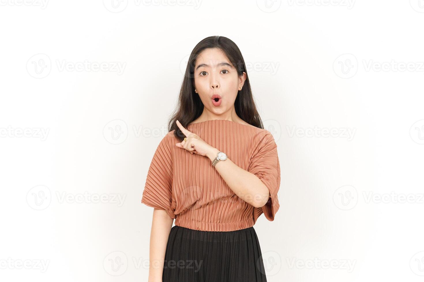 Showing Product and Pointing Side Of Beautiful Asian Woman Isolated On White Background photo