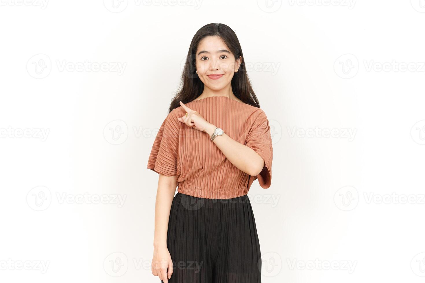 Showing Product and Pointing Side Of Beautiful Asian Woman Isolated On White Background photo