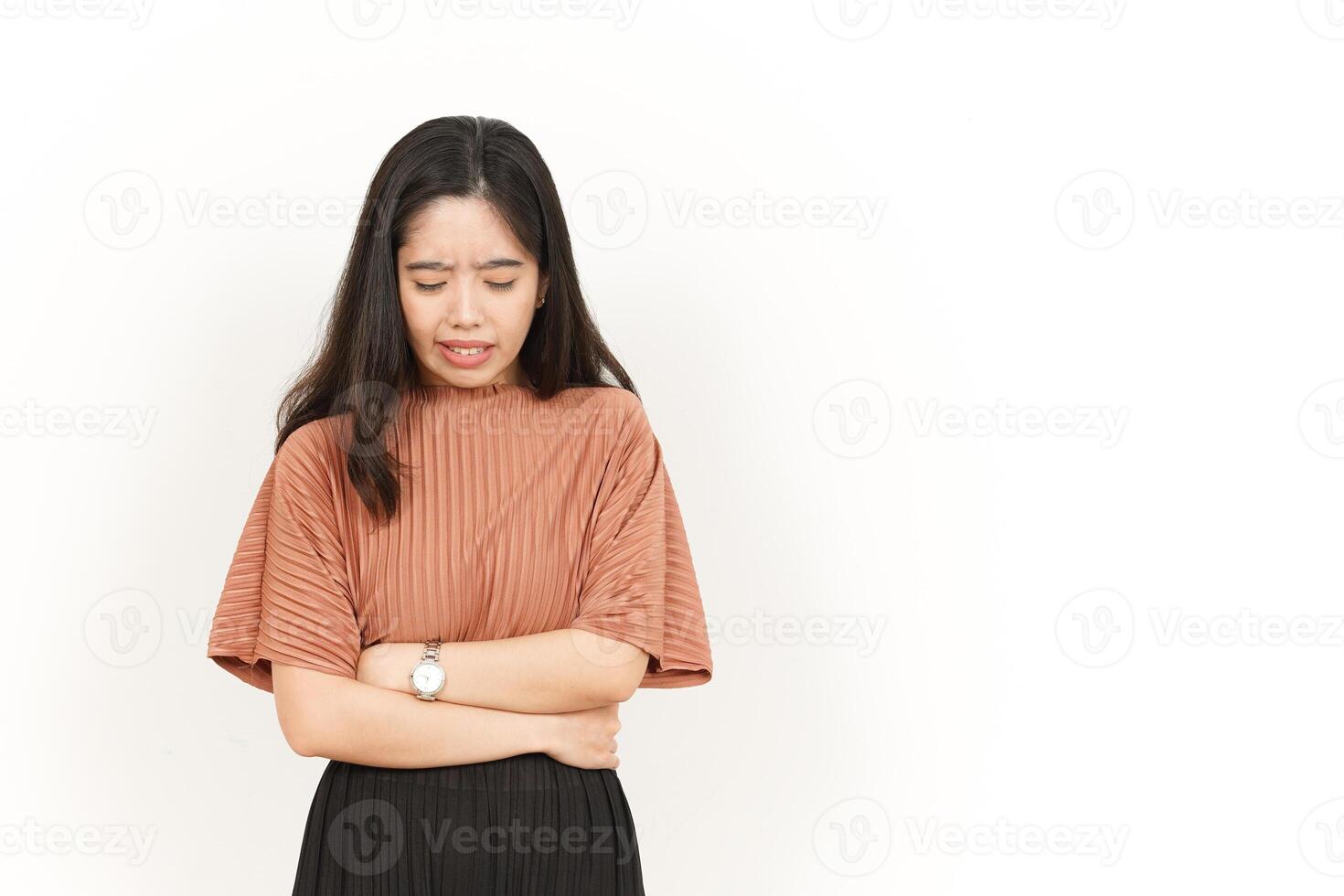 Suffering Stomachache Of Beautiful Asian Woman Isolated On White Background photo