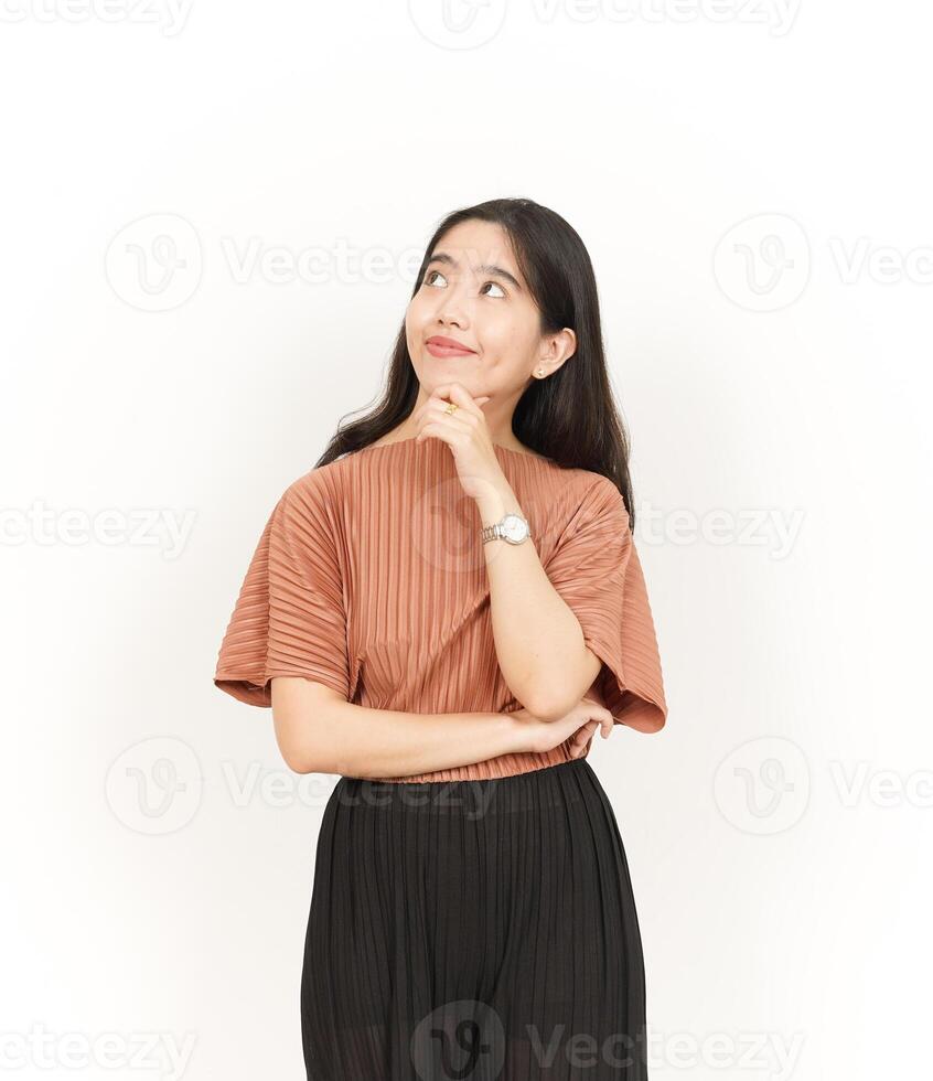 Thinking and Curious Of Beautiful Asian Woman Isolated On White Background photo