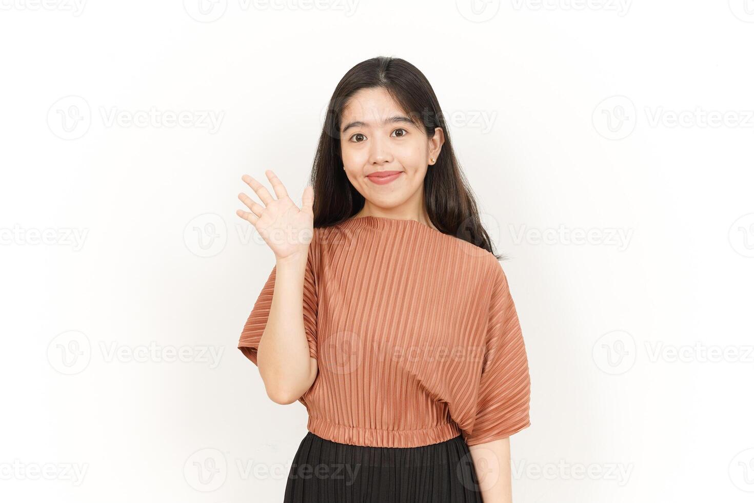 Hi Greeting or Waving at Camera Of Beautiful Asian Woman Isolated On White Background photo