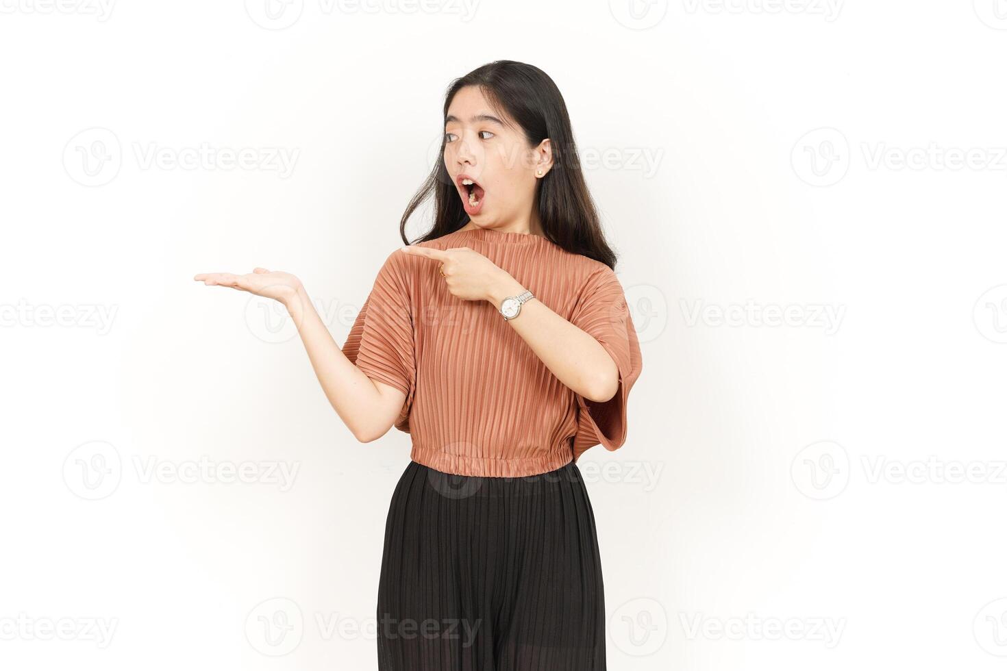 Showing and Presenting Product on Open Palm Of Beautiful Asian Woman Isolated On White Background photo