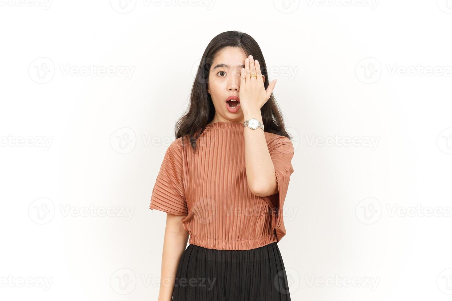 Shocked Face and Covering half face Of Beautiful Asian Woman Isolated On White Background photo